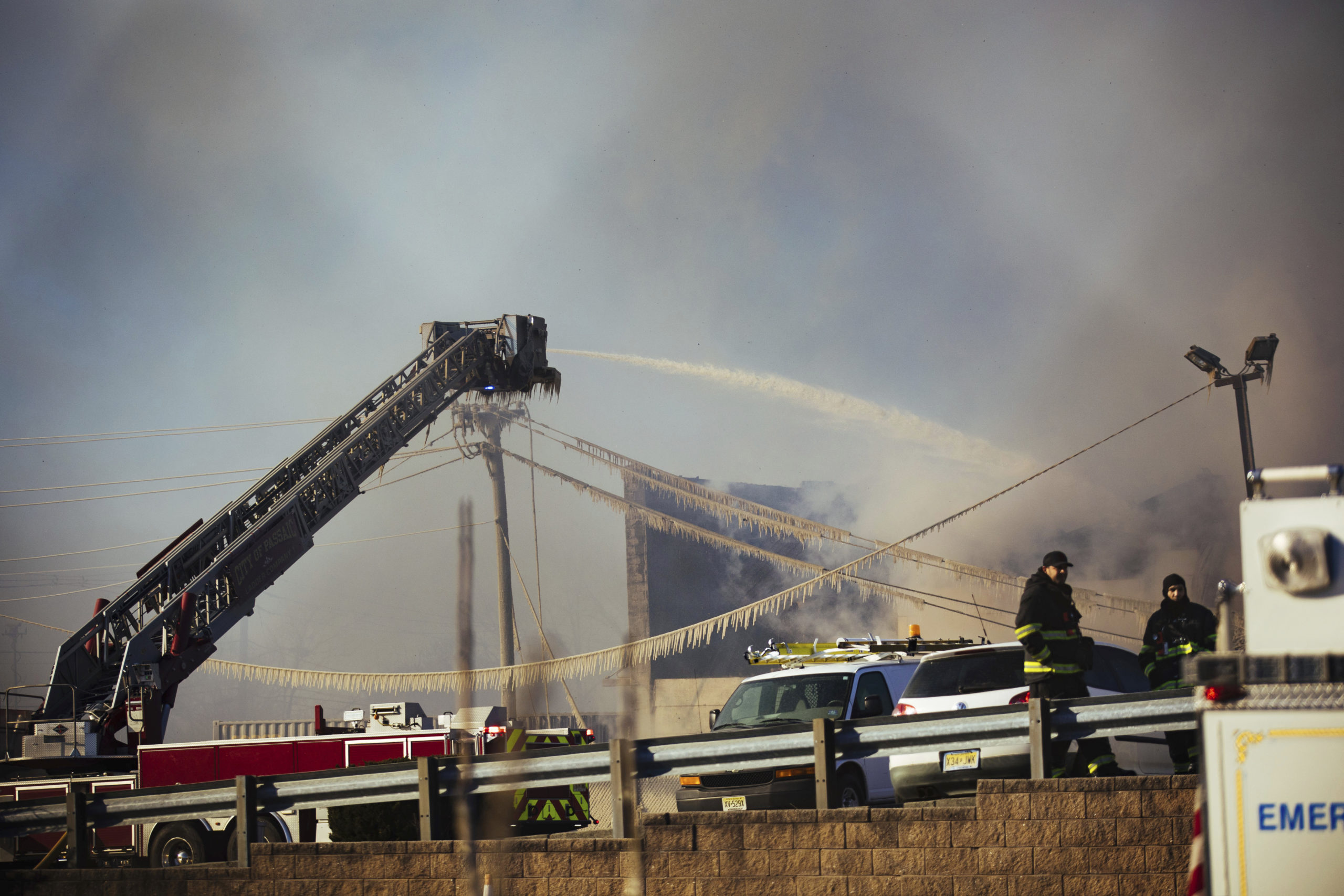 Firefighters Battle Separate Blazes At Amusement Park, Recycling Plant